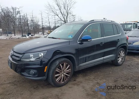 2014 Volkswagen Tiguan Sel z USA, uszkodzony, nr VIN WVGBV3AX2EW525813